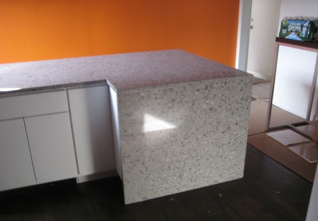 Residential Kitchen Project: Countertop with a pencil edge and full front drop-down in Alpina White Silestone.