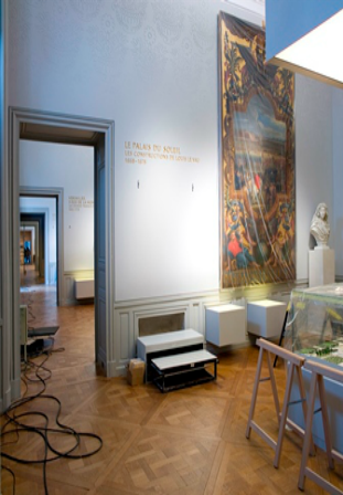 Figure 1 – Solid surface light boxes were installed on the lower wall to accomplish 3 main objectives – illuminate the paintings; offer information about the exhibits via backlit inscriptions; and serve to prevent the public from getting too close to the 