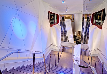 Figure 1 – The project called for the stairs and the escalator leading to the hotel to have the same geometric pattern as the upper level entranceways.