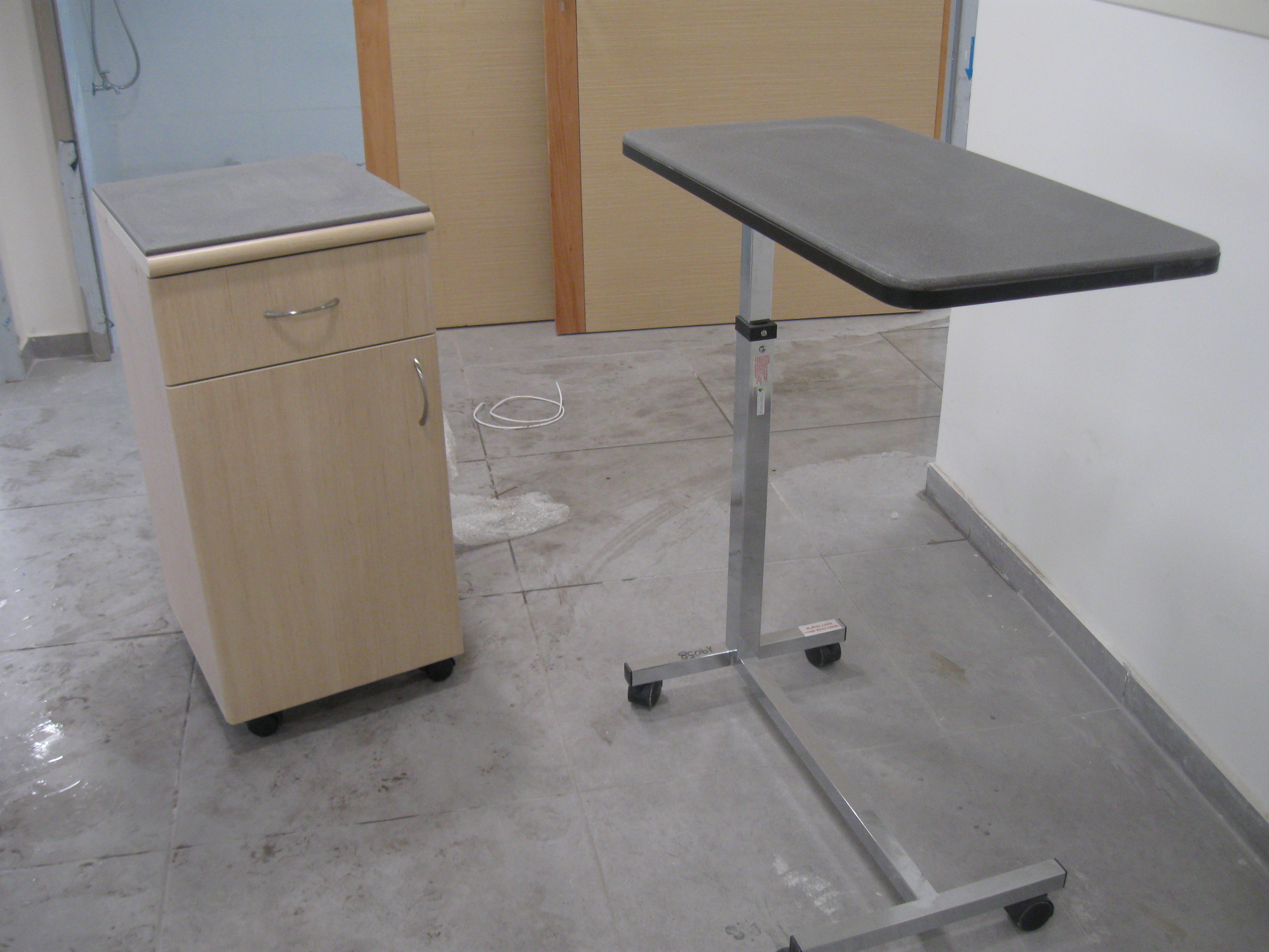 Figure 5 - The job called for fabrication and installation of 875-sq.-ft. of material, including the nurses’ stations, side bed tables, doctors’ room tables, window sills, linen carts, mobile patient tables, sink stations and break room tables – just abou